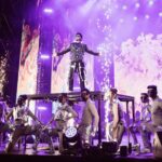 Devi Sri Prasad Instagram - ✨ Witnessing the magnificence of DSP's entry at the concert was an absolute game-changer! 🌟✨ From the moment he stepped on that stage, it was clear that this man knows how to make an entrance like no other. The air was charged with anticipation as the crowd erupted in thunderous applause, and the energy in the room soared to new heights. DSP's presence was electrifying, his charisma captivating, and his passion for music contagious. The atmosphere was nothing short of pure magic as he set the stage on fire with his mesmerizing talent. It was a moment that will forever be etched in our hearts. 🎶❤️ #DSPConcert #EntranceMaster #musicalmagic #oosolriyaoooosolriya Bukit Jalil National Stadium