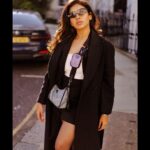 Dushara Vijayan Instagram - All eyes on me! . . . Shot by : @georgesimon_m Bag : @prada Hairstylist : @renuka_mua #streetphotography #fashionblogger #fashionista #devilwearsprada #prada #black #style #styleblogger #styleinspo #fashionstyle #london #luxury