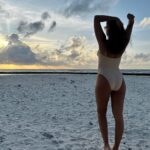 Elena Roxana Maria Fernandes Instagram - Beach bum! . . . #beachbum #beach #sand #sea #ootd #outfit #outfitoftheday #style #fashion #life #love #pretty #sunset #paradise #seaside #travel #travelgram