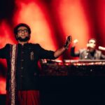 Haricharan Instagram - These are some amazing Pictures by @vengka_desh at the Recent concert in Kuala Lumpur with ARR sir. Always an Honour! Icing on the cake was sharing the stage with the super cute @ctdk , indeed an experience to Perform ‘Munbe Vaa’ with her. Grooving and Vibing with my Buddies on stage with another 72,000 of you malaysia. Etched in my Mind #dmy #arrahman #malaysia #haricharan