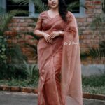 Jewel Mary Instagram - Moody tones brighter thoughts !!! This beautiful organza saree by @kalista_shaheera_noushad mua @mukeshmuralimakeover Captured by @ebysolickal #saree #organzasaree #handwork #photooftheday