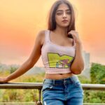 Khushi Dubey Instagram - A flame on the loose…. . . . #khushi #khushidubey #khushians #evening #evening #style #beauty #sky #aesthetic #landscape #peace #serene #breeze #naturelover #onlocation #winter #fashion #suave