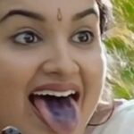 Lena Kumar Instagram - Here’s revealing the secret behind the colour on my tongue in this song…. We shot this sequence at 5 am on a beautiful day in the year 2000. I ate quite a few ‘Njaval pazhams’ and yet my tongue was not getting the purple colour. So finally director @laljosemechery asked the art director to paint my tongue with poster colour !! That’s what you are seeing in this pic !🤣 Marannittum enthino has been remastered in 4K . Was such a pleasure to watch this unforgettable song in the clarity it exists in my mind. #nostalgia #unforgettable #moments #film #trivia #marannittumenthino #music #malayalam #movie #2000 #memories Kerala
