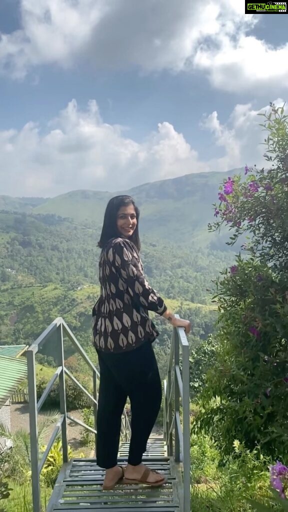 Leona Lishoy Instagram - My happy place @thekissingmountains in Vagamon. I never tire of the view from this property. I could spend hours watching the hill chain and breathing the fresh air! The burbling streams, rustling pine trees and chirping birds, all in perfect harmony. . . Video @pavel_dinesh #nature #howhillsmakemehappy #reels #reelitfeelit #instagood
