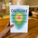 Lisa Ray Instagram - ‘One of the main obstacles in anyone’s quest for longevity is the fact that the skills that my colleagues and I acquired during our medical training have proved far more effective against fast death than slow death.’ Think about this statement. Now reading this remarkable book. I’m in what you call mid-life, living with a potent disease - keeping the beast in the cage as we say in the Multiple Myeloma community- and while ideologically and spiritually I believe I will be hanging around Samsara for a few more turns of the wheel, I know, in this present body, I won’t last forever. (Nor do I want to) But- but!- I know I want to live well, be healthy, strong, coherent, capable of tying my laces and better able to prance along as long as possible. This book by #DrPeterAttia is a lifetime of radical and revolutionary insights condensed into a very compelling read. He goes to the origins of disease and chronic conditions that seems to be the hallmark of our modern lifestyles. “In Outlive, Peter Attia explores the science of not just prolonging life, but also prolonging aliveness.” Doc Peter comes across as a learned adventurer, challenging the norms of the medical industry, and let’s face it, you have to be a bad ass to take on the status quo. While the tone of this book can be perceived as sinewy and data driven, it doesn’t make it less valid for someone like myself who favours instinct and a more feminine reading of crisis : I’ve learned to embrace any approach towards health that has intentionality even if it diverges from my way. There’s a lot if wisdom here. I’m all in. Cheers to improving my overall Healthspan ; how well you life rather than how long. I’ll leave you with this: ‘There comes a point where we need to stop just pulling people out of the river. We need to go upstream and find put why they’re falling in.’ - Bishop Desmond Tutu Thanks @penguinindia for sending this over. @peterattiamd #Outlive