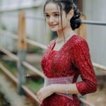 Meenakshi Anoop Instagram - Glimmer of red❤ Stylist and designer : @doms.2010 Costume: @western_lady_ Hair: @rathybaiju_mua jewellery: @anokhi_priyakishore Photography: @creative___media_ #style #happy #photo #life #nature #insta #cute #viral #likesforlike #model #music #travel #memes #explorepage #liker #girl #explore #selfie #india #beauty #k #lfl #trending #likeback #following #loveyourself #lifestyle #tiktok #photoshoot #photographer