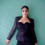 Neha Bhasin Instagram - It is not very often that I go the smoky eye route or do very matte eyes but I thought this powerful look deserved a hardcore bold smoky eye. Then again I started with nude lips and felt so bland that i added colour and glossed it up. Though i do feel my features come through with minimilistic make up but Fashion is about exoloring too and having fun with it. There are no rights or wrongs. It is a playground where you are willing to also get down and dirty 😉. I added @flibbertigibbetbeautty boo boo lashes to complete the eyes. Do check them out. Outfit @tanieyakhanuja Images @zookthespook #nehabhasin #fashion #smokyeyes #motd #lakmefashionweek
