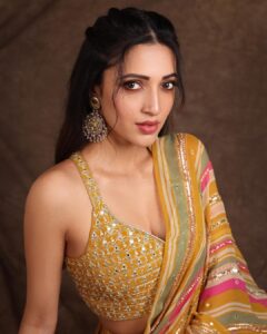 Neha Shetty Instagram - The art of eye contact. 

Styled by @jukalker 
Outfit @paulmiandharsh
@viralmantra
Jewellery @abhilasha_pret_jewelry 
Photographer @pranav.foto