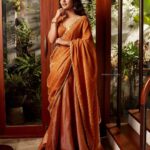 Priya Varrier Instagram - Happy Vishu!🌼 Photography: @arun_payyadimeethal Styling: @amritha_lakshmi___ @styledby_al_ HMU: @sreegeshvasan_makeupartist Outfit: @damanz.designs Jewellery: @anokhi_priyakishore Location: @nakedvolume_architecturestudio Camera assist: @rahul_.thuvassery_