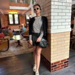 Roshni Chopra Instagram - Euro trip #capsulewardrobe 🧥🫶 👟@newbalance 574’s (on all looks) 👜 @balenciaga (on most looks ) Look 1 - Shorts @stradivarius Blazer- @massimodutti (men’s) Tank - @arketofficial Sunnies @jimmyfairly Look2 - Stripe tee - @arketofficial Jacket - @massimodutti Sunnies - @acnestudios Look 3 Pants - @mango Tee - @arketofficial Bag - @ysl Look 4 & 5 Skirt @mango Top @hm Cashmere knit @mango Trench - @burberry Look 6 Pants @hm Stripes cardi- @massimodutti Sunnies @jimmyfairly Look 7 Coords @shahinmannan Sunnies @acnestudios #rovive #rostyle #capsulewardrobe #holidaylook #europetravel #rowardrobe