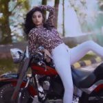 Sanam Shetty Instagram - Gear up for the week! Harley 🖤 Fatboy . . . Concept @samissiah Video @__thirdeyeweddings__ Photography @jagan_mathew Venue @sr_jungle_resort_anaikatti Logistics @joemichael.official Makeup @diyamakeover_ Hair @madhuzartistry #harleydavidson #photoshoot #comingup #fatboy #bikergirl