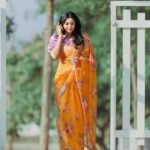 Sanam Shetty Instagram - What plans for the weekend? 💛💜 . . . Organza saree by @6yarddrape Styling @shyn_fascino Photography @adam_kae Drape @the_thish MUH @sujitha_makeup_artist Venue @the_french_town #happyweekend #lightweightsarees #organza #satinblouse #sanam #sanamshetty #goldenhour