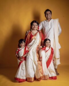 Sandra Thomas Instagram - It’s our birthday as parents to this beautiful angels 😇 

📷: @pournami_mukesh_photography 
Outfit : @meenumjoseph 
Stylist : @joe_elize_joy 
Curator: @nivethithasanjay 
Assisted by : @sanliya_sabu 
Makeup : @zara___makeover 
Blouse stitched by : @edesignsbythasneem 

#birthdaytheme #traditionalwear #bengali #thankakolusu #supernaturalfamily #family #influencer #filmproducer #toddlerlife #twins #girls #lifeline #youtubers #grandchildren #daughters #lovequotes