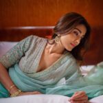 Shriya Saran Instagram - Shot with the amazing @deepak_vijay_photography he makes pictures look like a painting . You are an artist . Thank you @ajshetty for connecting us Wearing @sithara_kudige mint green saree . @kabzaamovieofficial @makeupbymahendra7 @priyanka_sherkar1 Jwellery @kushalsfashionjewellery