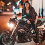 Esha Deol Instagram - Here’s one of my favourite pictures. Wonder why I took so long to post it . Shot by @popmercy during #lockdown & this beauty the #triumph bike was borrowed from my buddy @itszayedkhan ( thank you 🙏🏼) I remember how mercy & I hopped across the street late at night and managed to get these shots 🏍️ #picoftheday #throwback #throwbackthursday #bikelovers #bikelife #eshadeol #gratitude