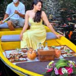 Samiksha Jaiswal Instagram - Picnic on a boat with koi fishes all around!💛 Serenity!💛 . . . . . . . . . . . . . . #kamandalu #ubud #koifish #date #picnic #instagood