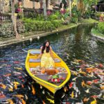 Samiksha Jaiswal Instagram - Picnic on a boat with koi fishes all around!💛 Serenity!💛 . . . . . . . . . . . . . . #kamandalu #ubud #koifish #date #picnic #instagood