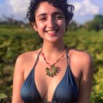 Sanjeeta Bhattacharya Instagram - My sweet guide, Budi made me a necklace out of a leaf as we walked out to the breezy rice fields after wading through the canyon waters of Beji Guwang. As someone who can’t swim properly and to my horror, having slipped inside the watery dark cave (not pictured here since I was busy gasping for air), never have I appreciated sunlight more, I think it shows 🌻 #baliindonesia Beji Guwang Hidden Canyon Trek