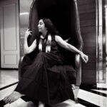 Suhasini Maniratnam Instagram - Met all the cast and crew of ponniyin Selvan on Saturday. I saw this chair ( throne ) and walked away from all and sat on this bold arresting striking chair , one person came running to take pictures of me. And said kundauvai Nandhini poonguzahli 😄😄😄😄😄kept on clicking. any guesses who it would be.