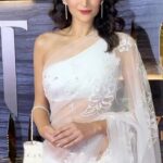 Dipannita Sharma Instagram - Reeling in white … Neeyat in theatres today ! Sari : @dilnazkarbhary Jwellery : @dashia.in Bag : @eena.official Shoes : @fizzygoblet Makeup : @sonamvaghani.mua Hair : @jayshreethakkarhairartist Style by @who_wore_what_when Photographer : @thefirstclik Posted @withregram • @zoomtv @dipannitasharma looks like a vision in white at the screening of #Neeyat! #sarilove #allwhite #zoomtv #zoompapz #bollywood #reels #reelsinstagram