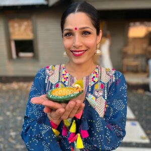 Freida Pinto Instagram - Diwali is such a special part of my childhood. For years with travel and work, I was pulled away from the traditions and celebrations of this joyous festival. But this year with Rumi in my life I took a much required pause and brought on some parts of the festivities to our home.  It was emotional and heartwarming celebrating with my family and friends. Cannot wait to keep doing this year after year. Happy Diwali! 🎇