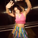 Isha Talwar Instagram - Rangeeli Bijlee says “Talk to the 🖐️”… ! Promotion day 2 for Saas bahu aur 🦩 Shot by @yugammonga Make-up @nikitashak Hair @hairmovesartistry Stylist @sobia93 Skirt @shopdrawn Jewellery @the.olio.stories #circusoflife🌈