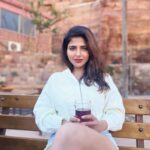 Iswarya Menon Instagram - Sipping on black tea infront of this picturesque view ☕️