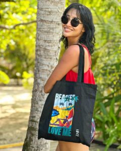 Nalini Negi Instagram - Love how versatile the bag is. You can use it for the beach, but it would also make a great shopping or grocery bag. It's definitely a must-have for summer!

That tote bag is perfect for beach days held by actor/influencer @nalininegi 

#zabyzain #beachesloveme #totebag #sustainablefashion