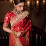 Aarthi Instagram - There is a goddess within each of us. Only a red saree can ascertain that. . . . . . . . . . . #weddingseason #glamitup #blingiton #sareelove #indianfashion #bigfatindianweddings #familytime #glamtribe 🥻 @sabyasachiofficial 💎 @amrapalijewels @mangatrai36jubileehills 💄 @leiyamua @dolma.tamang 📸 @kiransaphotography 🧍🏻‍♀️ @anitha.cookie @nasima28