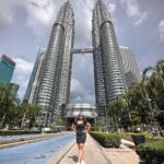 Aashika Padukone Instagram - Double the beauty, double the majesty - Twin Towers of Malaysia standing tall in all their splendor! #kualalumpur #petronas #travel #TwinTowers #Malaysia #IconicArchitecture #DoubleBeauty #MajesticLandmarks #SkylineWonders #ToweringHeights #UrbanMarvels #TravelGoals #CityscapeViews Twin Towers, Malaysia
