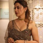 Anusree Instagram - The gorgeous @anusree_luv in a Saree by @t.and.msignature stunning neck piece by @m.o.dsignature Featuring a #sleeveless blouse enveloped in intricate #blooms. The entirety of this sheer drape is immersed in #beadwork & #sequins, creating a mesmerising visual effect !!Reflecting light with every movement, this ensemble shimmers gracefully enveloping the adorner in a tapestry of luminous charm . . Makeup @sajithandsujith Outfit @t.and.msignature Jewellery @m.o.dsignature Pic @mahesh_bhai . . . To know more, Contact: 0484-4043131 or WhatsApp: +91 94002 74705 . . . . . . . . . #Anusree #TandMsignature #tiyaneilkarikkassery #tandmbrides #partywears #ocassionwears #bridalwears