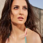 Elli AvrRam Instagram - Let’s get Tropical🌴 Magazine: @globalspaindia Chief editor: @parineetasethi Stylist: @juhi.ali Photographer: @nikhilshenoyphoto Make-up: @fab_beauty___ Hair: @arvindkumar_hair Monokini: @limerickofficial Earrings and rings: @rubans.in Bracelet: @kushalsfashionjewellery @rubans.in Heels: @lodishoesindia Cinematographer: @chalchitrakar Location: @radissonblumumbaiairport Co-ordinated by: @nadiiaamalik #globalspa #magazine #covergirl #summervibes #elliavrram #yourstruly
