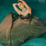 Elli AvrRam Instagram - Come join the Mermaidination if you’re not afraid of water🧜🏻‍♀️ Magazine: @culturedwedding Managing Editor: @yadav_manjeet Business Head: @divyanijain1925 Photographer: @nikhilshenoyphoto Stylist: @juhi.ali Make-up & Hair: @mehrasilky Outfit: @kalkifashion Jewellery: @ghanshyamdaskotawala @ashishkotawala Location: @the.venya Co-ordinated by: @nadiiaamalik #elliavrram #yourstruly #mermaid