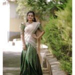 Gopika Anil Instagram - Elegance is not being noticed, it's about being remembered ! ♥️✨ . This beautiful bottle green dhavani designed by @thanz_muhammed @thanzscouture 🥰 Jewels : @amyra_rental_jewels 📸 @sarathsanilphotography . #onamseason #onamfestival #celebration #asianet #starnight #maveli #thanzcouture #amyrajewels #pictureoftheday #ootd #ethnic #elegance #gopikaanil #gopsgopikaanil