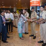 Hema Malini Instagram - I would like to congratulate the Ministry of Civil Aviation & DG BCAS for initiating the Aviation Security Culture Week across India with an endeavor to raise awareness on Aviation security with a commitment to make air travel safe for all. Thank you CISF and the entire team of Security professionals at Mumbai International Airport, for making our journey safe and secure. Remember, Security is everyone’s responsibility -  See it. Say it. Secure it. I would also like to thank CISF and Airline security staff who were assembled (20-30 staff) on my way, post security and I appreciate their efforts in making Air travel safe and secure at Mumbai Airport.@csmia_official for Mumbai Airport @MOCA for Ministry of Civil Aviation @moca_goi #securityculturalweek #mumbaiaviation #mumbaiinternationalairport