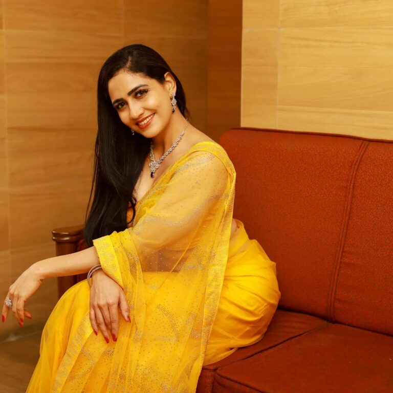Komal Sharma Instagram - Yellow flower #actress #yellowsaree #model #viral #trending #photoshoot #komalsharma Captured by - @vivid_impressions__