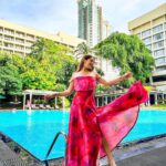 Kritika Sharma Instagram - When you want to turn heads! Outfit @siseraa_ Styled by @the_neerajpandey Earrings @trazenie Location @cinnamongrandcolombo #travel #srilanka #gown #girl #model #indian #howtoposeingown #redgown Cinnamon Grand Colombo
