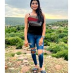 Lahari Shari Instagram - Reaching new heights, both figuratively and literally. Standing proud on this hilltop, embracing the beauty around me. The world below fades away as the drama of the sky consumes me.🌟✨ #NewHeights #EmbracingBeauty #JourneyOfALifeTime #LifeAtTheTop #DreamsAndReality #OnTopOfTheWorld #DramaticViews Gandikota Adventure Trip