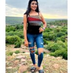 Lahari Shari Instagram - Reaching new heights, both figuratively and literally. Standing proud on this hilltop, embracing the beauty around me. The world below fades away as the drama of the sky consumes me.🌟✨ #NewHeights #EmbracingBeauty #JourneyOfALifeTime #LifeAtTheTop #DreamsAndReality #OnTopOfTheWorld #DramaticViews Gandikota Adventure Trip