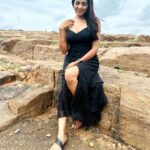 Lahari Shari Instagram - Conquering new heights and unleashing my inner strength. Standing tall and slaying every challenge that comes my way. ✨🖤💃 #Fearless #Powerful #Unstoppable #PosingLikeAPro #StandingTall #RockingThePose #RockOn Designer and Stylist : @adamohyd Gandikota Adventure Trip