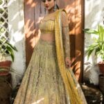 Mirna Menon Instagram - A dream come true mustard and green lehenga, A hand embroidery gradient skirt paired with a matching mustard blouse and an embellished sheer dupatta. Enriched with gota embroidery, this lehenga is a stand out beauty. Featuring @mirnaaofficial Shot by @hariz_comrade Hair and make up @chisellemakeupandhair Jewellery @mspinkpantherjewel Outfit @studio149 #studio149 #embroidery #embroiderylove #weddingwear #weddingfashion #weddingaesthetic #bridal #bridalstyle #bridalfashion #aesthetic #bridallook #bridallehenga #designerlehenga #lehenga #receptionlook