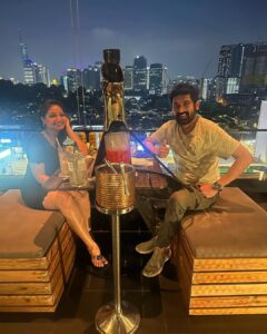 Priyanka Nalkari Instagram - #dinnerdate with @rahulvarmas🍽️ ❤️👩‍❤️‍👨 #mandatorypic #instamood #actress #blackfrock #frocklover #malaysia #mantrarooftop #resto #evenglights #view #goodnight