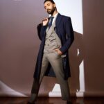 Raghav Juyal Instagram - For @tmmindia Creative Director & Stylist @poojagupta9528 @spectrumstyleswork Photographer @visualaffairs_va Suit & trench coat @absolutoofficial Shoes & bag @irontailorofficial