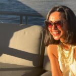 Sayani Gupta Instagram - Meet Audrey & Murray. Both 97. We met them on the Sunset cruise at Hayman. We noticed them &@smritikiran expressed how cute they were. As the 🛥️ took off I couldn’t help go say hi. And the rest is History. So A&M went to school together since they were 4..when he would carry her books for her. They were friends.. (I asked if Murray had a crush on Audrey to which she quickly quipped & said Oh YES!) she knew he liked her and of course there was an understanding. After school and beginning of collage Murray had to go for the War(WWll), he was in the navy. While he was away.. Audrey got married to another man. He came back after the war and married someone else too. They both had children with their respective partners. But kept in touch.Later they both lost their partners. One day Audrey was coming out of her house and a bike came and stood in front of her. On it was a man with 🪖& 🕶️ . She couldn’t see his face & told him why he would stop in front of her this way. As he took out his helmet, he said.. ‘Audrey, you don’t recognise me? It’s Murray!’ She couldn’t believe her eyes. They rekindled their friendship. And sometime later Murray moved in with her. They started dating 6 years ago and got married one and half years ago. Now they live in her house (not his mansion) &travel together. While Murray struggles to remember things (Audrey is sharp), She struggles to walk (Murray wheels her around). It’s the perfect Companionship. I told her how fitting her name was.. Audrey (like Hepburn)! She said ‘You have beautiful hair’. To which Murray added.. ‘Oh Darling! Just the hair! I am sitting here wondering how many marriage proposals she would get in a day!’ Audrey and I slightly choked!😂 As we spoke about other worldly things like kids & disappointments & ailments & coral reefs.. Audrey asked me if I were married & had children.. I told her I wasn’t. So she held both my hands and said.. ‘here’s to finding Mr.Right!’ (Now from their story Mr.R may come when I am 90.. who knows). But as the Sun went down & I had made new friends.. I was reminded of how unexpectedly beautiful life turns out if you let it perhaps! A&M is now, my fav love story. 🤍🤍