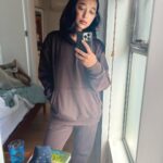 Sayani Gupta Instagram - Catching some morning light & chilling in my uniform! Thank you @airbnb for a warm cozy stay in #melbourne Oh and the neighbour’s cat! 🦘🤎🥥 Fitzroy, Melbourne