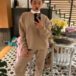 Sayani Gupta Instagram - Catching some morning light & chilling in my uniform! Thank you @airbnb for a warm cozy stay in #melbourne Oh and the neighbour’s cat! 🦘🤎🥥 Fitzroy, Melbourne