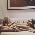 Sayani Gupta Instagram - Catching some morning light & chilling in my uniform! Thank you @airbnb for a warm cozy stay in #melbourne Oh and the neighbour’s cat! 🦘🤎🥥 Fitzroy, Melbourne