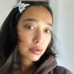 Sayani Gupta Instagram - Catching some morning light & chilling in my uniform! Thank you @airbnb for a warm cozy stay in #melbourne Oh and the neighbour’s cat! 🦘🤎🥥 Fitzroy, Melbourne