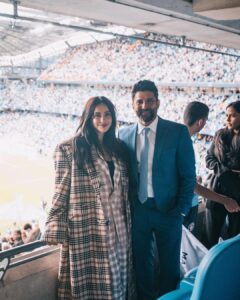 Shibani Dandekar Instagram - There is just nothing like sport! To witness people come together in support of their team is pure magic! The energy in the stadium last night was electric! What an experience and what a game! ManCity you were 🫶🏾 all the best in Istanbul! 

photos by the greatest @sebporter 
Thank you 💙 
@etihad #etihad 
@mancity #mancity 

outfit by my girl @kanikagoyallabel @goyalkanika 🤍
Farhan’s Coat @sshomme 
Shoes @dmodotofficial