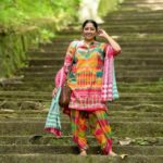 Anumol Instagram - My next look from @145east ’s Onam look book... 🌼🌈 I know the trend leans toward Kerala Kasavu sarees for Onam these days, but I remember when colorful dresses were all the rage, at least for me, about 5-6 years ago! 💃 Here's another stunning multicoloured set from @145east , The entire set comes with a tunic, dhoti pants and a dupatta made out of different gamchas all coming together that makes it look like a piece that you’ll not see anywhere else and it's super comfy too. Don't forget to use my code ANUMOL15 for a 15% discount on this dress. 🛍️✨ @pranavcsubash_photography click #OnamLook #ColorfulOnam #145EastFashion #ComfyStyle #DiscountCode #ANUMOL15 #Anumol #Anuyathra #gamcha Rayiranellur,Naduvattam